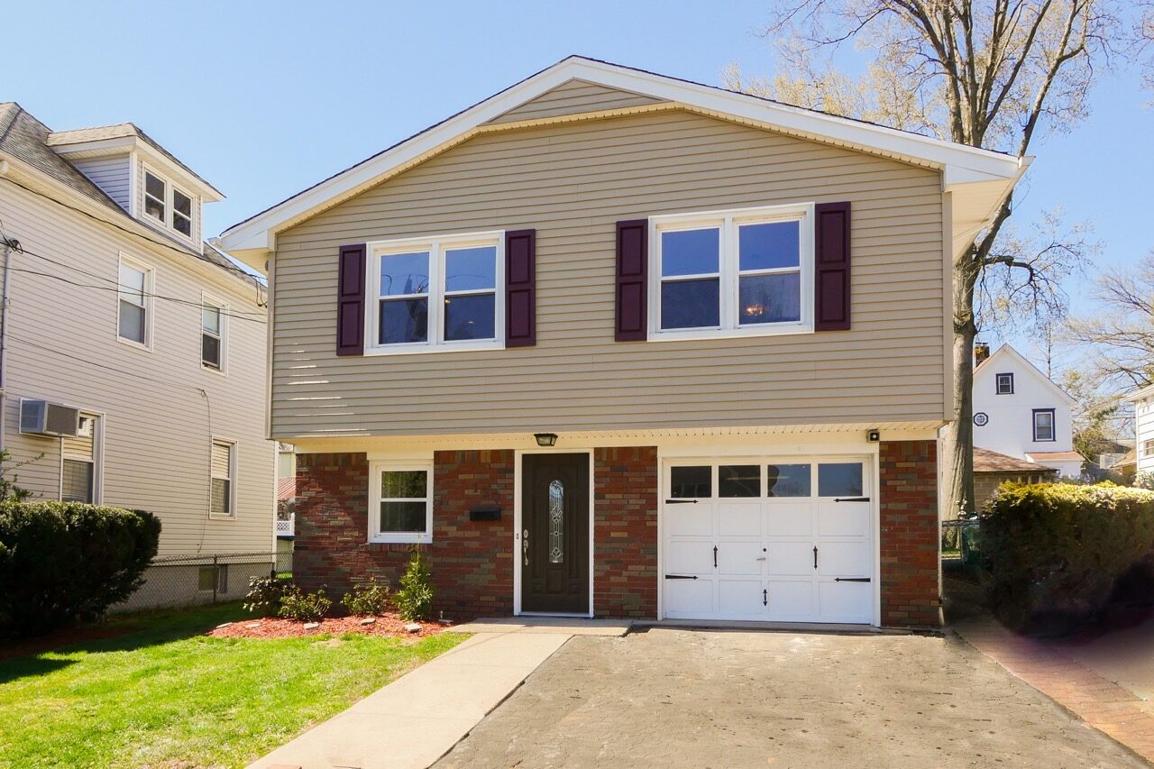 Classic Bergen County split-level home representing the typical move-up family transaction