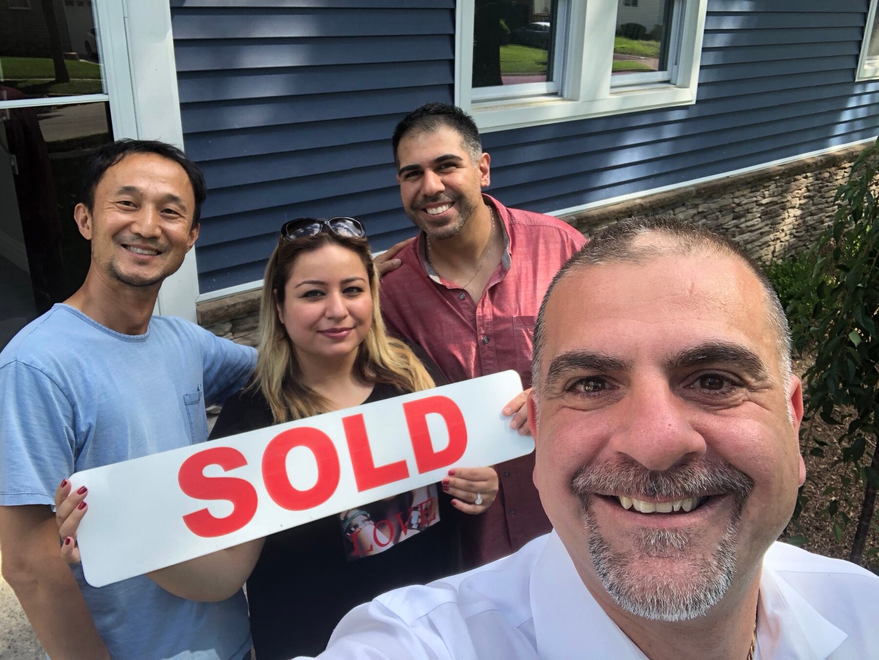 Avo with happy clients at closing