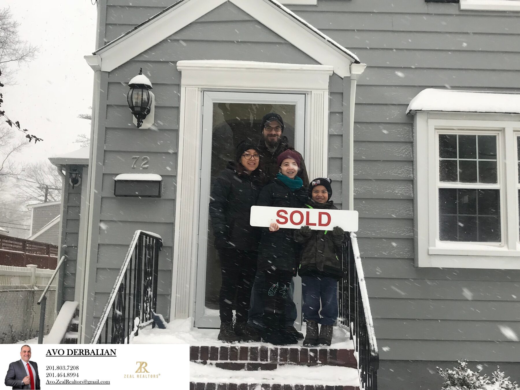 First-time buyer family with SOLD sign in front of their new Bergen County home on closing day