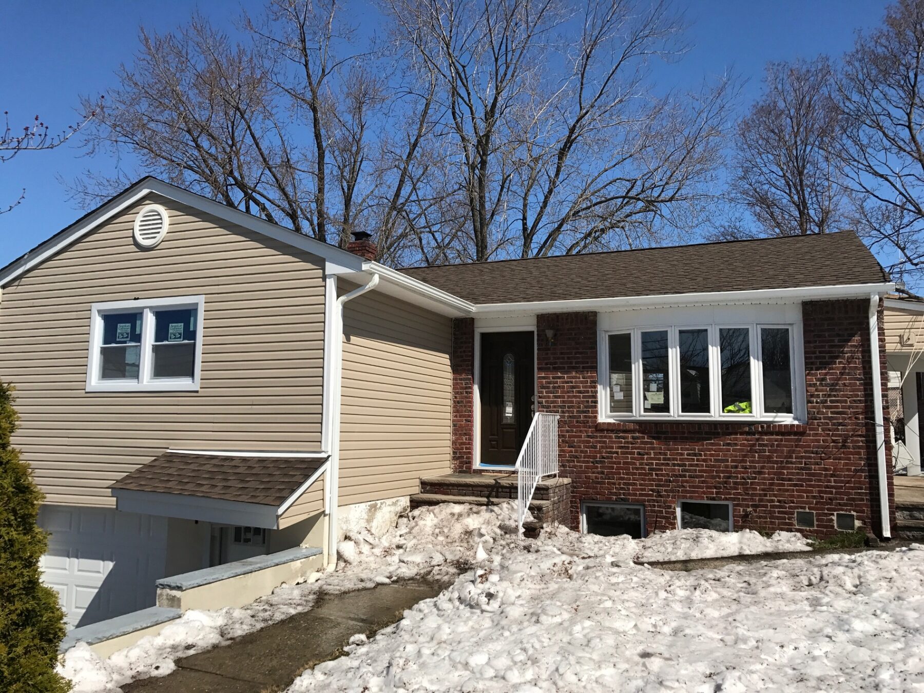 Bergen County split-level home in winter representing a typical low-rate-locked owner's property