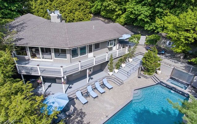 Aerial view of a Bergen County estate with pool - professional listing photography by Avo Derbalian